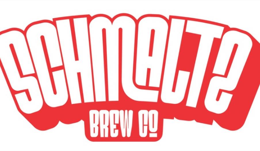 Schmaltz Brew Co logo featuring bold white lettering outlined in red on a bright red background.
