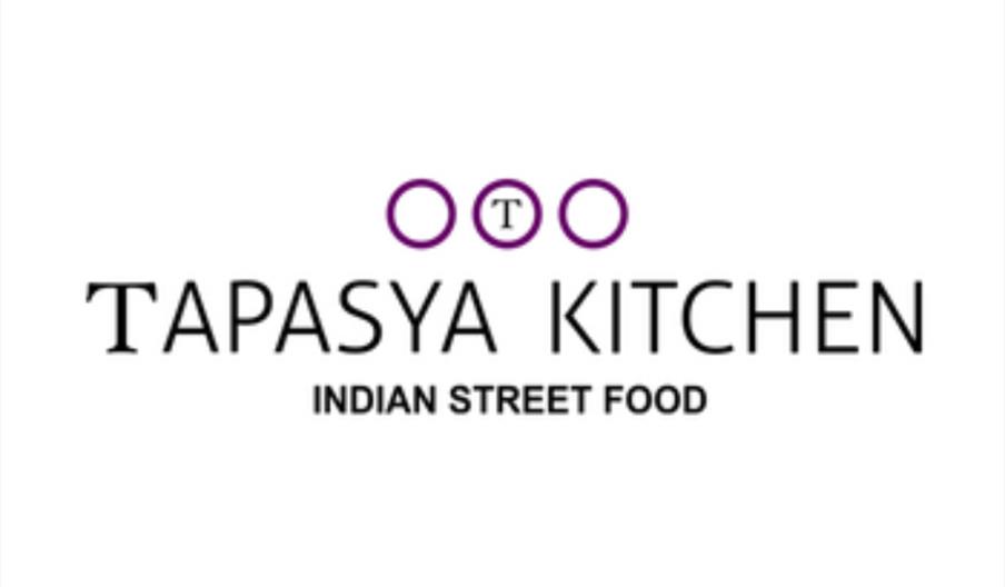 Logo for "Tapasya Kitchen Indian Street Food" with three purple circles above the text, the middle circle containing the letter "T".
