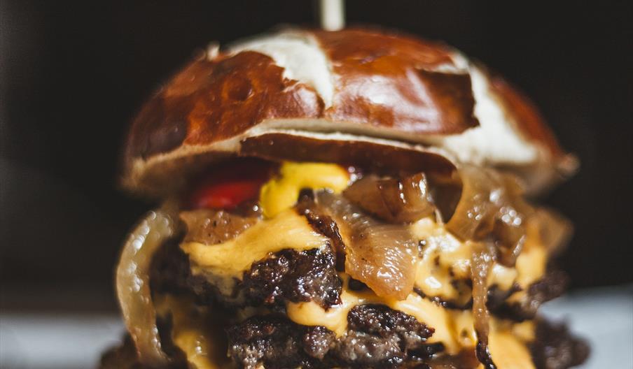 Delicious double burger with cheese and onions.