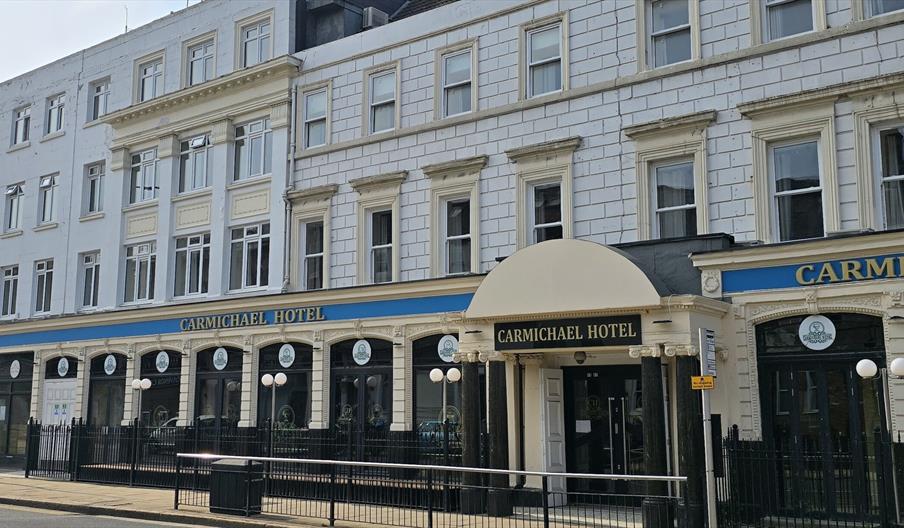 Exterior of hotel white and cream building