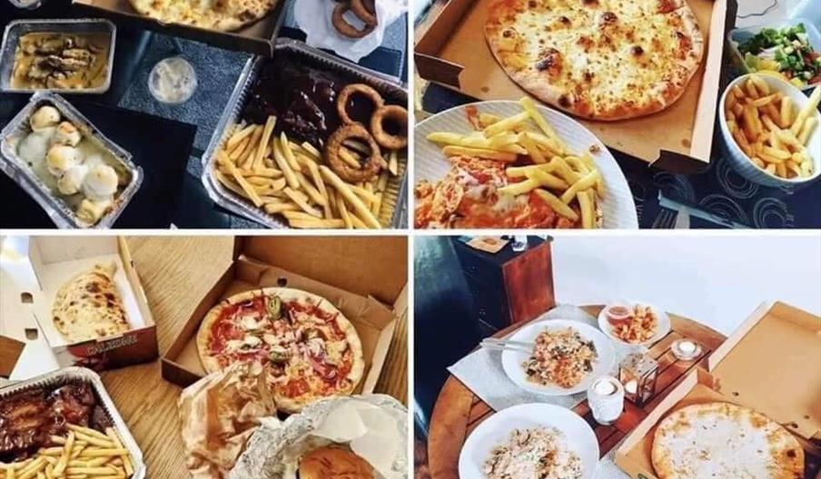 A collage of four images, each showing a table filled with takeout food including pizzas, french fries, pasta, onion rings, salad, and burgers, arrang