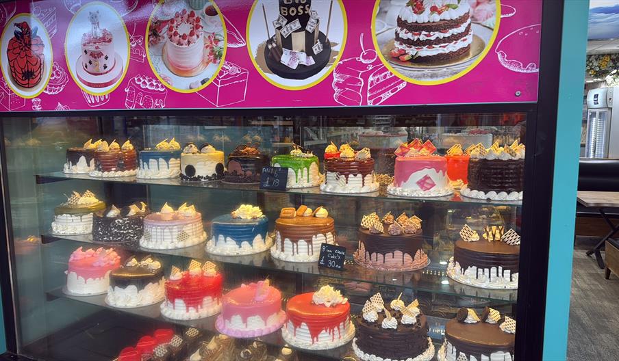 Glass cabinet with a selection of decorated celebration dates.