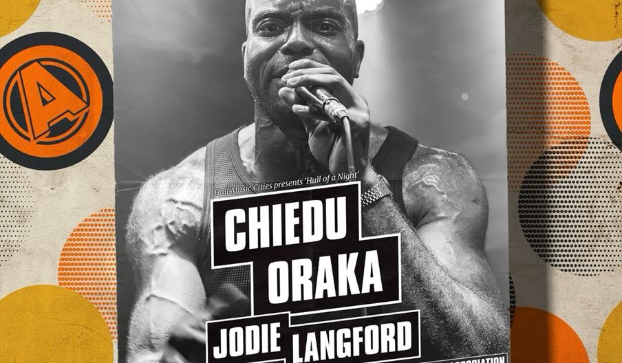 A concert poster features a black-and-white close-up photo of a muscular man holding a microphone, sweating and performing on stage. Text over the ima