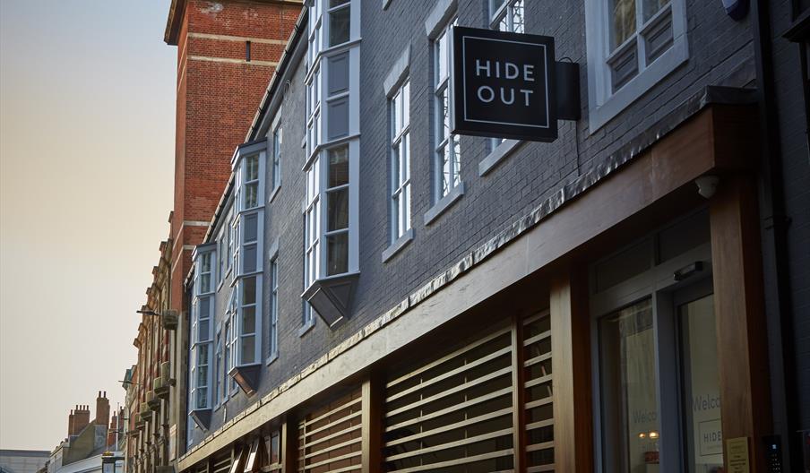 Exterior image showing main entrance and sign