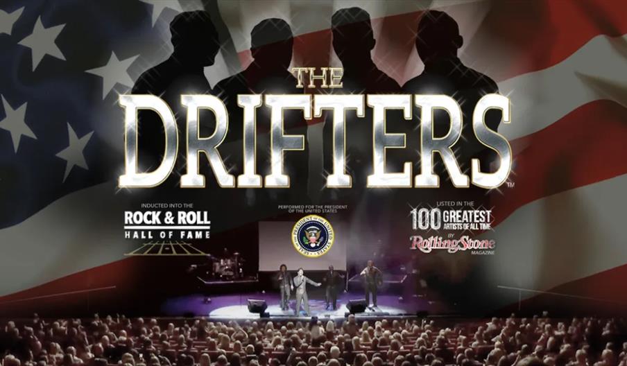Promotional image for The Drifters featuring large gold and silver text of their name against a backdrop of the American flag, shadowed silhouettes of
