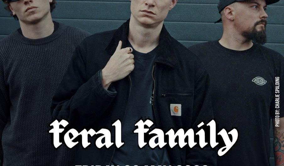 Three men stand in front of a blue metal wall, with bold text overlaid that reads "feral family" and details a concert on Friday 29 May 2026 at Hull T