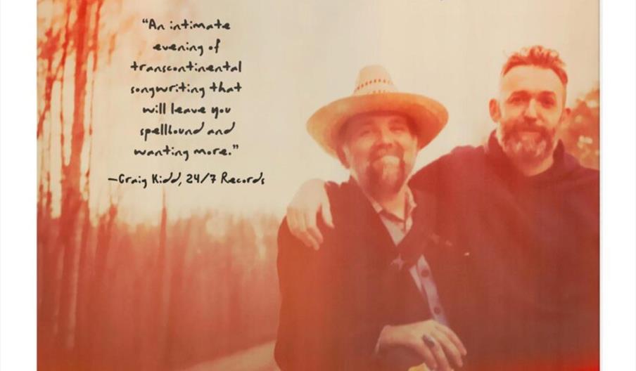 Promotional poster for a music event featuring a photo of two men standing together outdoors, one wearing a hat, with text reading "Gordon McKinney &