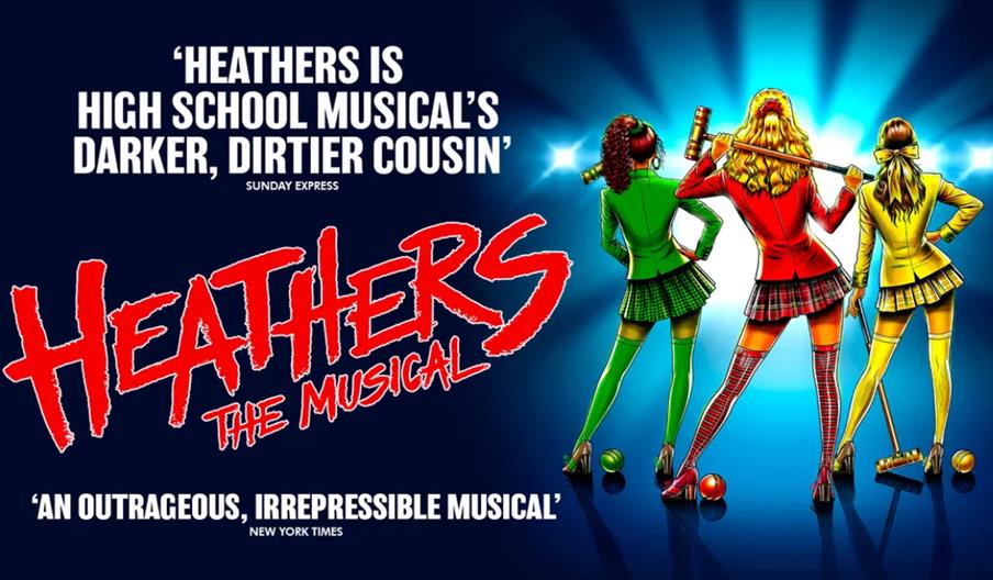 Poster for "Heathers The Musical" featuring three young women in green, red, and yellow school uniforms standing with their backs to the viewer, each