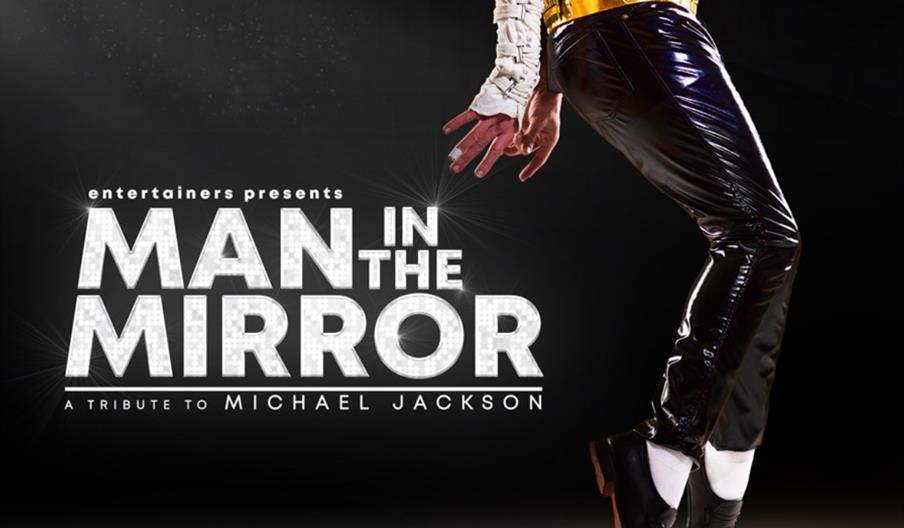 A promotional image for "Man in the Mirror: A Tribute to Michael Jackson" featuring the lower half of a performer dressed in Michael Jackson's iconic
