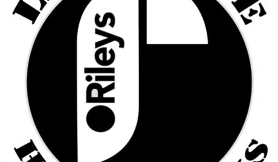 Black and white circular logo with the words "LIVE VENUE" at the top and "HULL, E. YORKS" at the bottom, featuring an abstract design in the centre wi