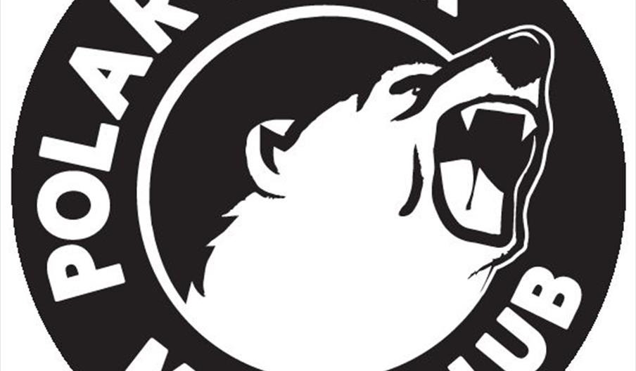 A circular black and white logo featuring a roaring polar bear head in the center, surrounded by the words "Polar Bear Music Club" in bold, capital le