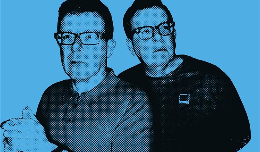 A half-tone style image of The Proclaimers, standing side by side against a solid blue background. The man on the left clasps his hands, while the man