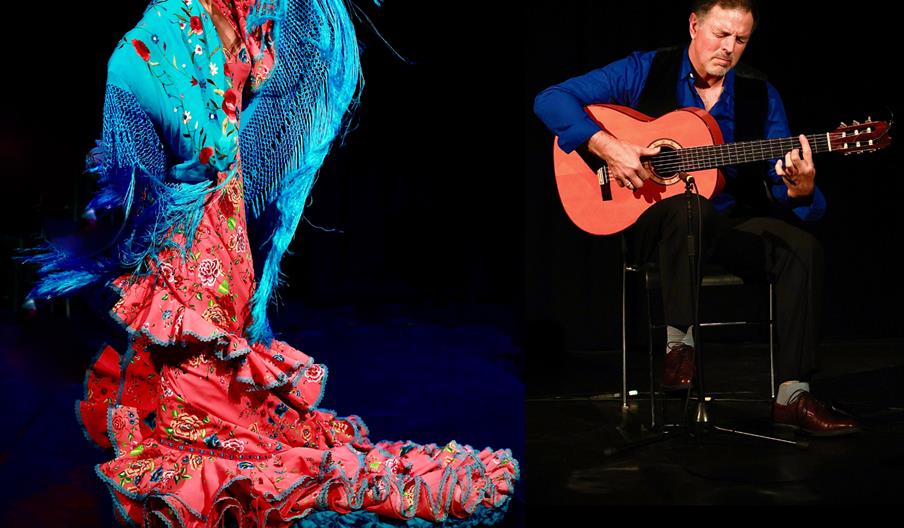 A flamenco dancer in a colorful, ruffled dress with a blue shawl poses dramatically, while a seated guitarist in dark clothing plays a classical guita