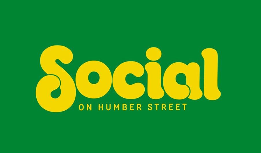 Yellow text on a green background reads "Social" in large, bold, rounded letters, with smaller text underneath that says "ON HUMBER STREET."