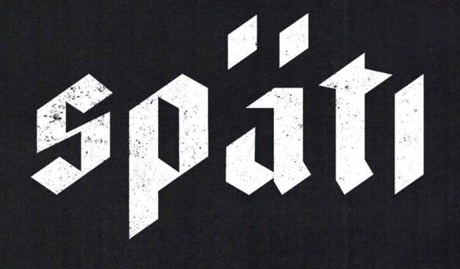 The word "späti" is written in a bold, white, Gothic-style font with a distressed texture on a solid black background.