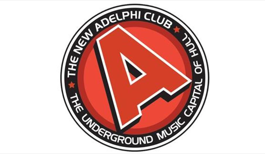 A circular logo with a large red letter "A" in the center. Around the "A," the text reads "The New Adelphi Club - The Underground Music Capital of Hul