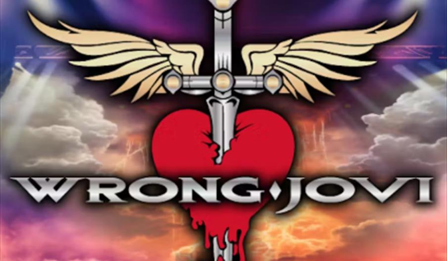 A stage background with colorful lights and clouds, featuring a large graphic of a winged sword piercing a bleeding red heart. The text "WRONG JOVI" i