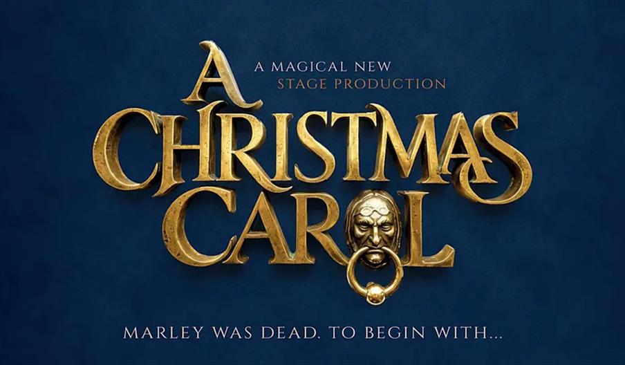 Promotional image for a stage production of "A Christmas Carol" with gold, ornate lettering on a dark blue background, featuring a decorative door kno
