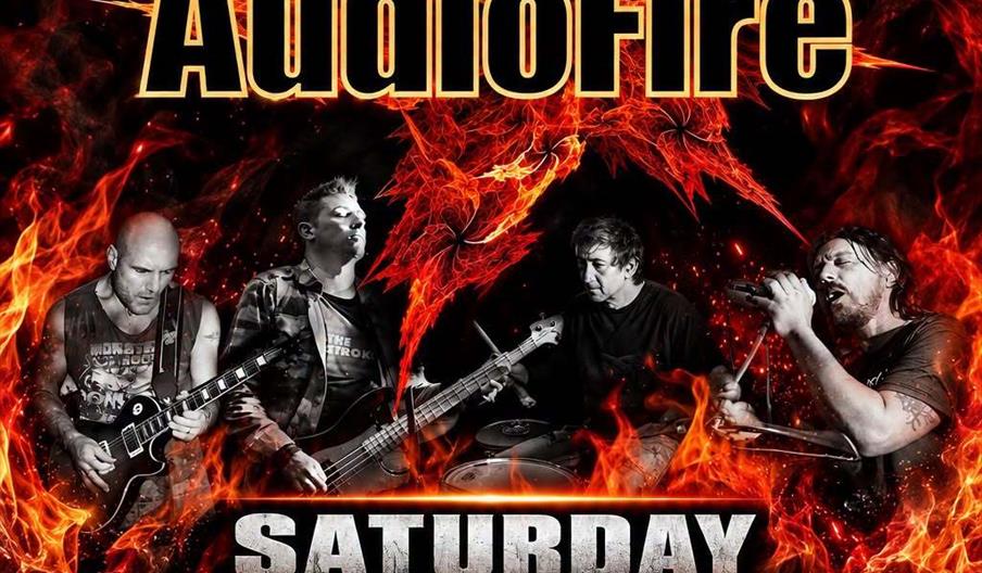 Promotional poster for "Hull Rock Night Christmas Special" featuring the band AudioFire, with a fiery background, black and white images of the band m