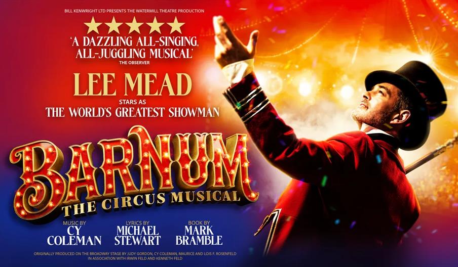 Poster for "Barnum: The Circus Musical" featuring a man in a red ringmaster's coat and top hat with spotlights and circus lights in the background. Th