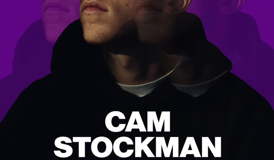 A promotional poster features a young man in a cap and hoodie against a purple background with a blurred, layered effect of his face. The text announc
