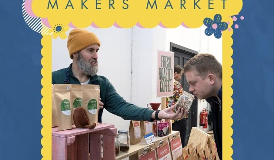 A promotional poster for Hull's Makers Market features a photo of a bearded vendor in a yellow beanie offering a jar to a customer at a stall with bag