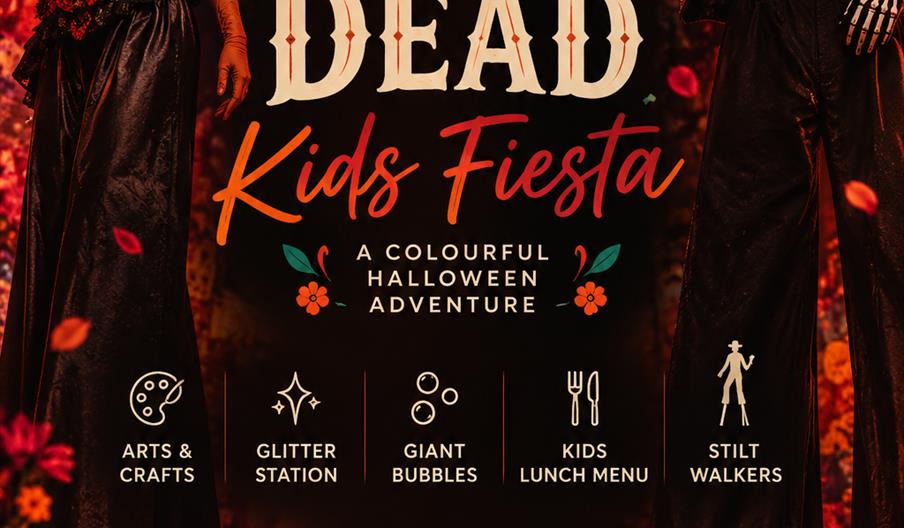 Colorful event poster for a "Day of the Dead Kids Fiesta," featuring two performers in elaborate Day of the Dead costumes and face paint. The poster l