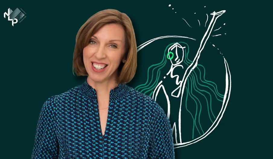 A smiling woman with short brown hair wearing a blue patterned blouse stands in front of a dark green background with a white and green abstract line