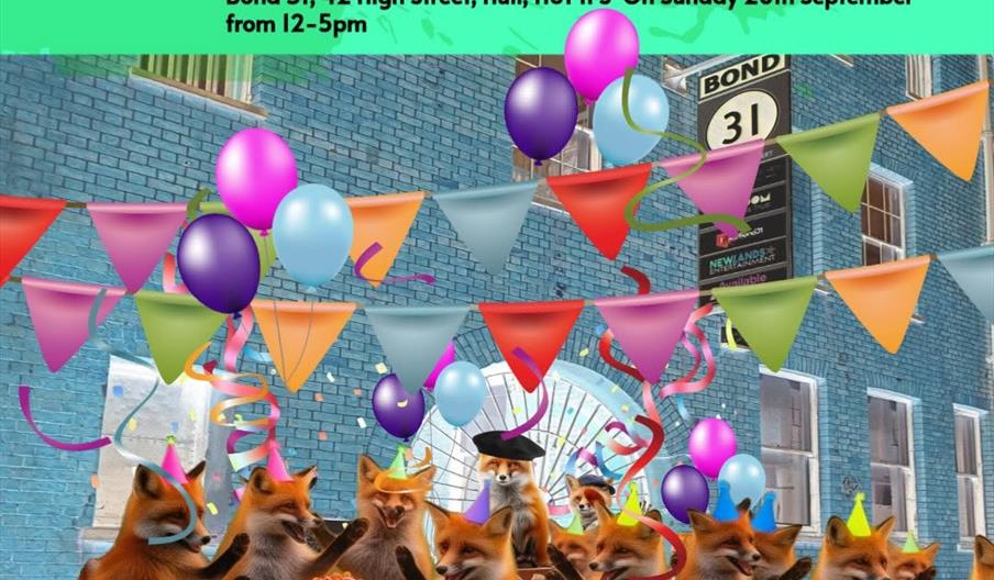 Colourful event flyer for Feral Art School's open day, featuring illustrated foxes in party hats, bright balloons, and streamers in front of a blue br