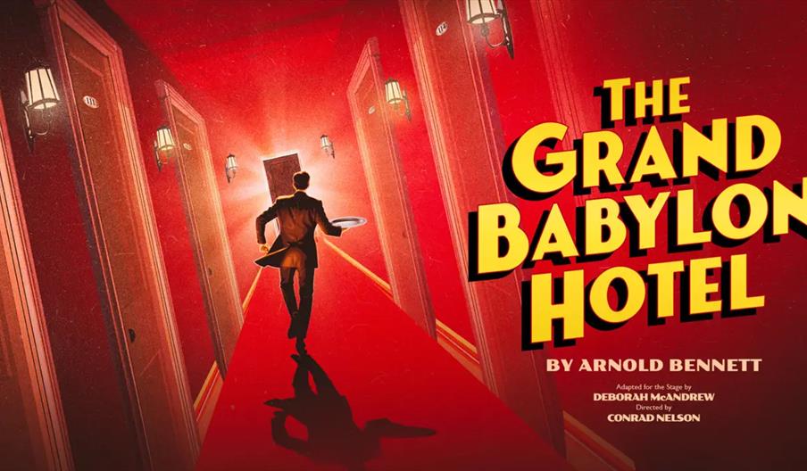 Illustration of a man in a suit running down a red hotel hallway carrying a tray, with doors and wall lamps lining the corridor. Large yellow text on