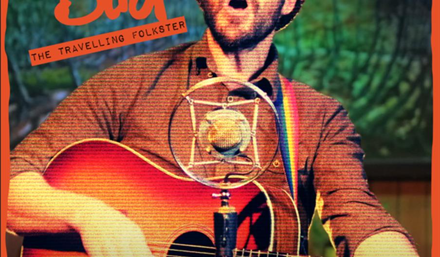 Promotional poster featuring a bearded musician with a hat singing and playing acoustic guitar in front of a microphone. The text reads "Harry Bird Th