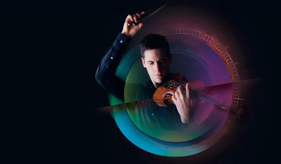 A man playing a violin is illuminated at the center of the image, surrounded by colourful, circular light effects and abstract clock-like patterns aga