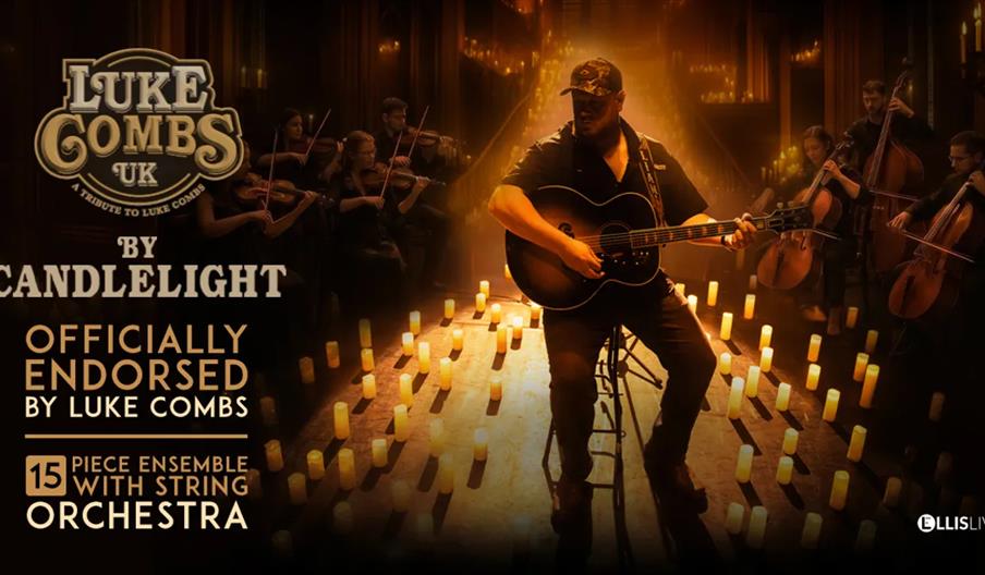 A man sits on a stool playing guitar, surrounded by glowing candles and a string orchestra in a dimly lit, elegant room. Large text promotes "Luke Com