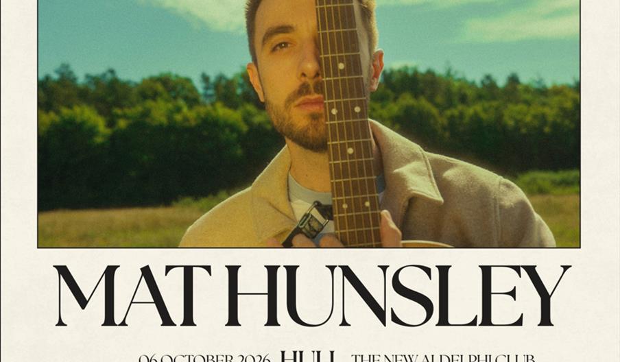 A promotional poster featuring a man outdoors with a guitar held vertically, obscuring half his face, with text announcing a Mat Hunsley concert on 6