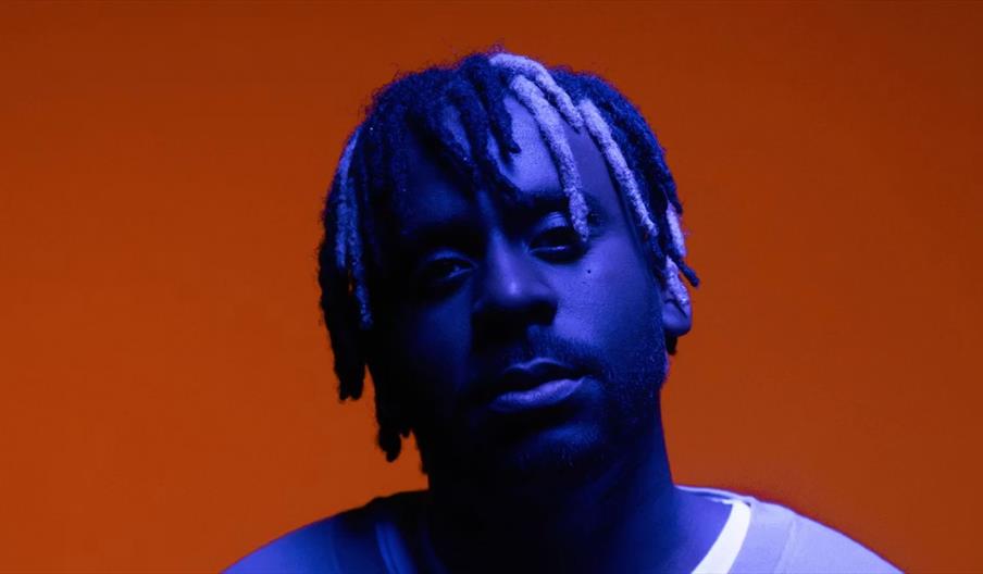 Myles Smith in blue appears on an orange background.