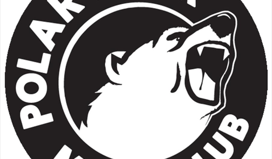 A circular black and white logo featuring a stylized, roaring polar bear head in profile, surrounded by the words "Polar Bear Music Club."