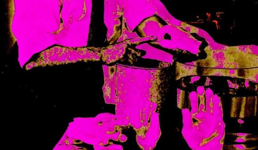 Event poster with a stylized, high-contrast image of a man in a suit and tie rendered in pink and black, with the text "ROTHCO ALL DAYER" at the top.