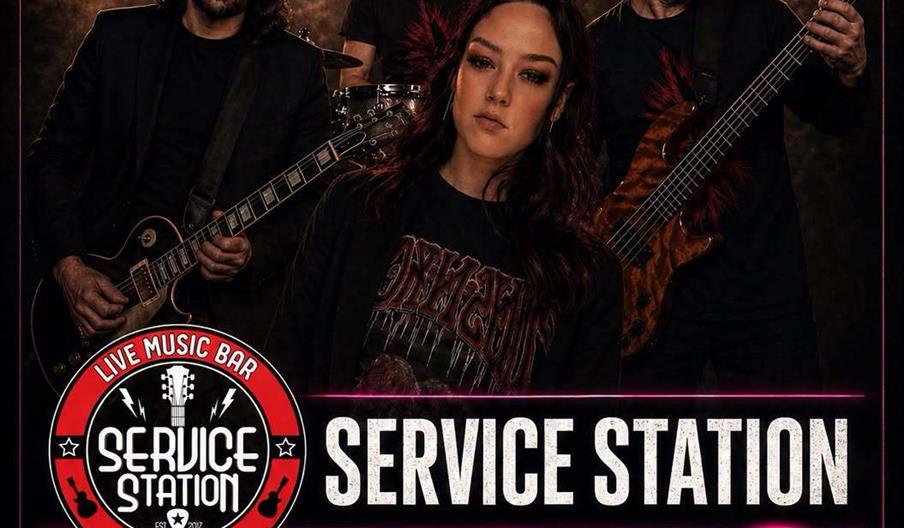 Promotional poster for a live music event featuring the band Scapegoat, with members posing under dramatic lighting. The event is at Service Station,