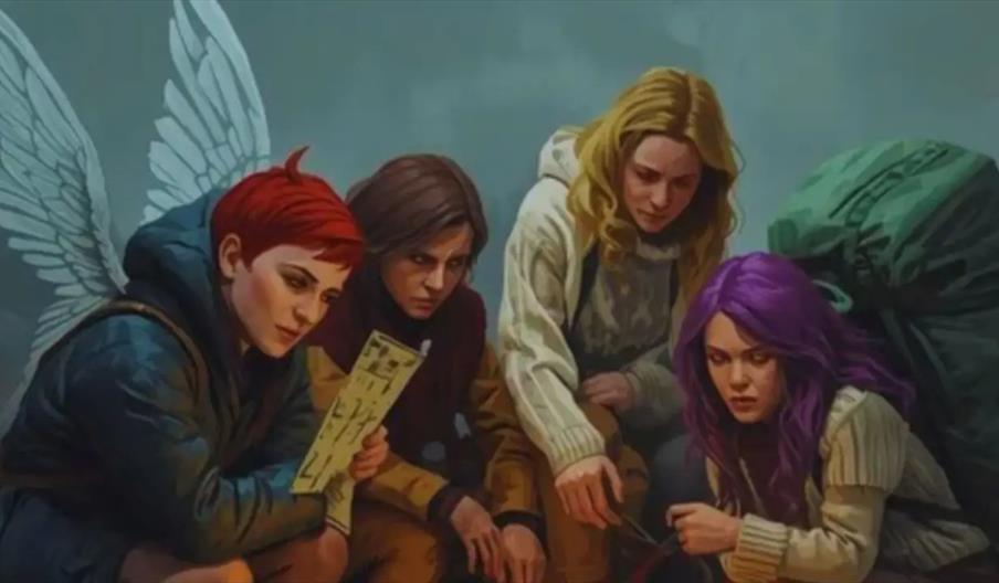 Four young people with colorful hair and fantasy clothing, one with angelic wings, kneel together examining a map or document intently. The background