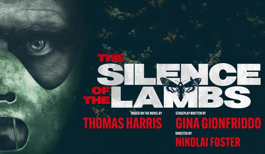 Poster for "The Silence of the Lambs" stageplay showing a close-up of a man's face wearing a metal mask on the left, with the title in large white tex