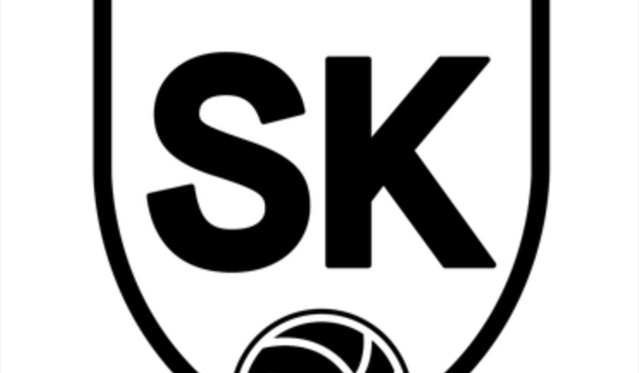 A black shield logo on a white background, with a crown at the top, a football at the bottom and the letters 'SK' in the middle.
