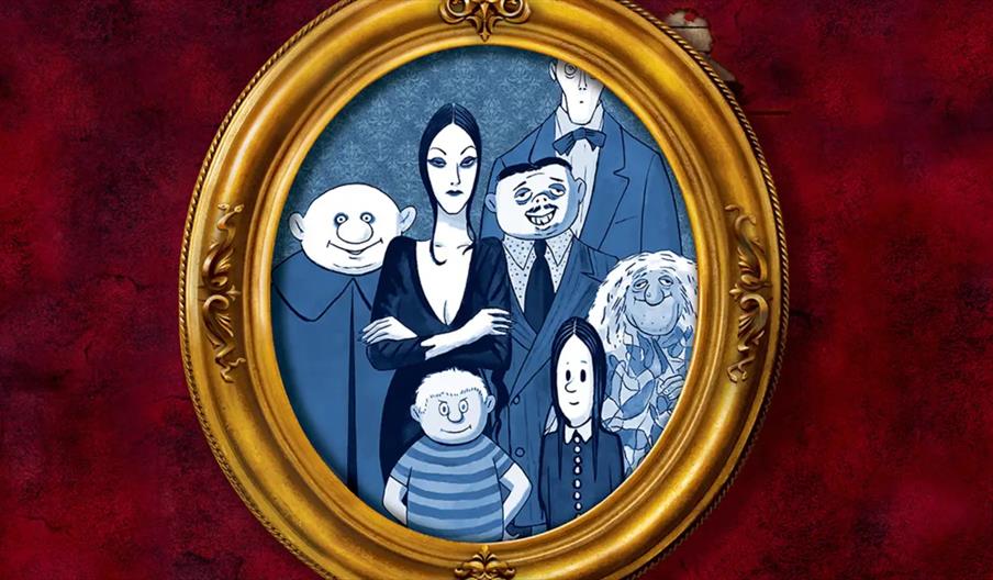 A vintage-style oval gold frame displays a cartoon portrait of the Addams Family, featuring seven characters with exaggerated features against a blue