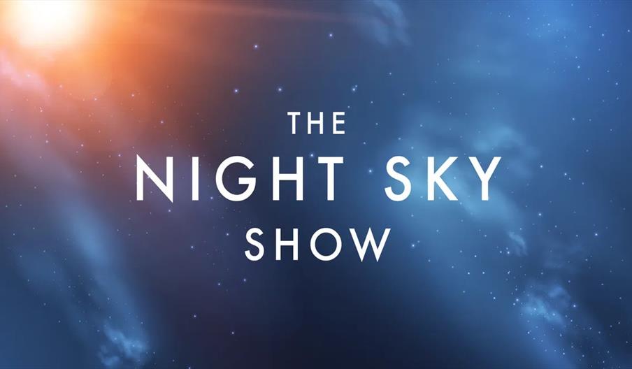 Text reading "The Night Sky Show" appears over a dark blue, star-filled sky with a bright orange glow in the upper left corner.