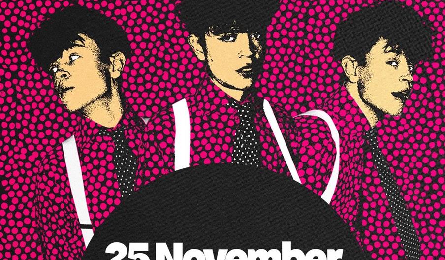 Promotional poster for Tom A. Smith's event, featuring three stylized, pop art images of the artist against a pink dotted background with bold white t