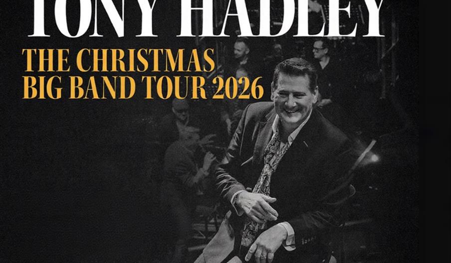 Promotional image for "Tony Hadley: The Christmas Big Band Tour 2026" featuring Tony Hadley seated and smiling in a suit, with band members blurred in