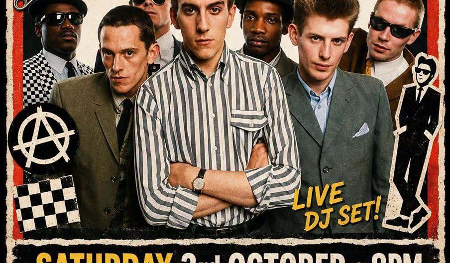 Poster for a music event titled "TOTALLY WIRED" featuring six men in retro suits and sunglasses, with text promoting punk, new wave, 2-tone, and post