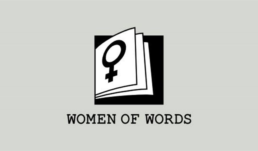 A simple logo showing an open book with the female gender symbol on its cover, above the text "WOMEN OF WORDS" on a light gray background.