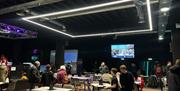Picture of Bar Area with TVs and Projectors