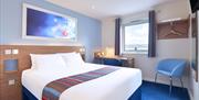 Double room in corporate blue and red.