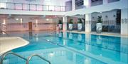 Large indoor swimming pool.